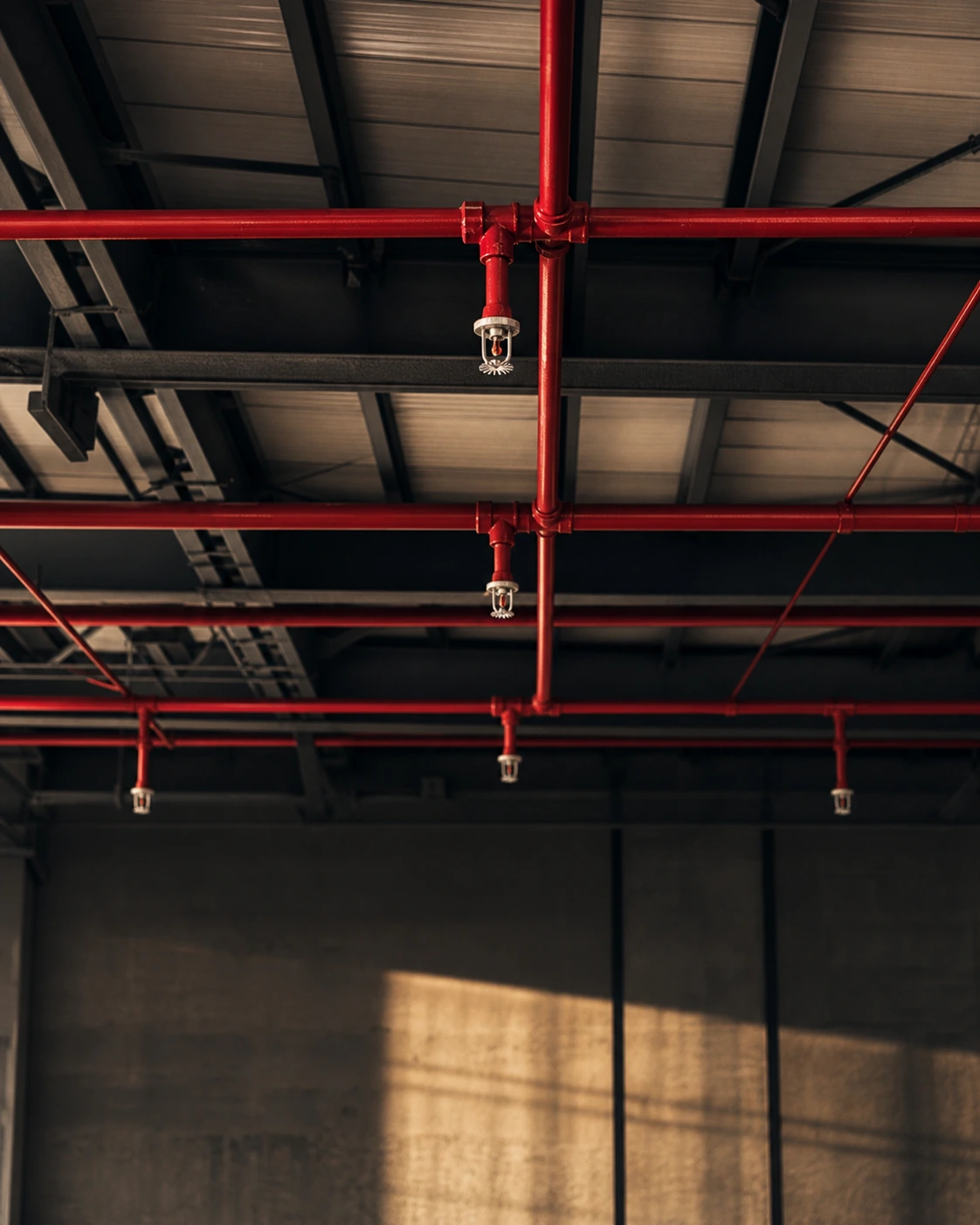 Automatic sprinkler heads in a warehouse